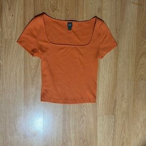Orange short sleeve shirt